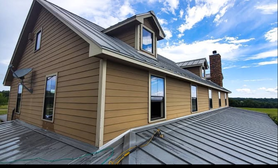 Large ranch home with a long run of windows along the roofline